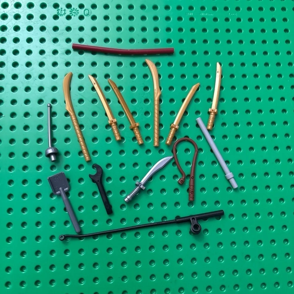 LEGO Minifigure Weapon Accessory Lot Golden Swords, Tools, Whip, Shovel, Mixed